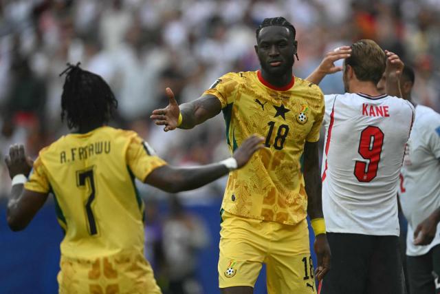 Ghana's defender #18 Jerome Opoku (C), Ghana's forward #07 Abdul Fatawu (L) and England's forward #09 Harry Kane (R) react after a draw in the  2026 World Cup Group L football match between England and Ghana at the Boston Stadium in Foxborough on June 23, 2026.  (Photo by MAURO PIMENTEL / AFP)