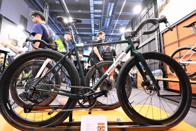 People visit a booth at the EUROBIKE 2026 fair of the international bicycle industry in Frankfurt am Main, western Germany on June 24, 2026. According to the organisers, more than 1,500 exhibitors of the bicycle and ecomobility industry from 60 countries will present their products and services during the fair running from June 24 to June 27, 2026. (Photo by Kirill KUDRYAVTSEV / AFP)