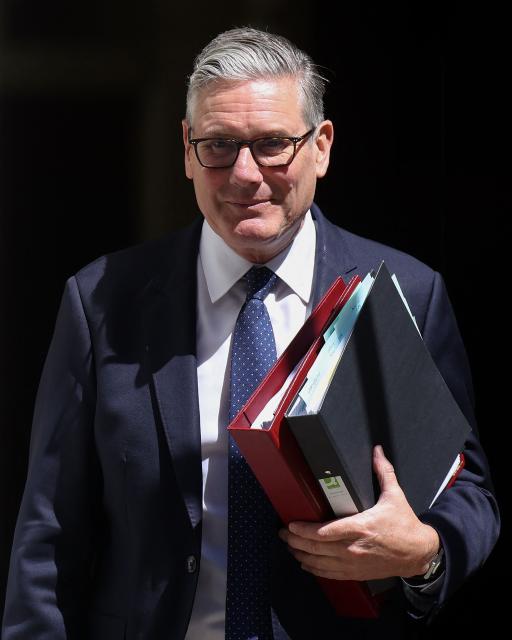 Britain's Prime Minister Keir Starmer leaves 10 Downing Street in central London on June 24, 2026, to take part in the weekly session of 'Prime Minister's Questions' (PMQs). (Photo by Toby Shepheard / AFP)