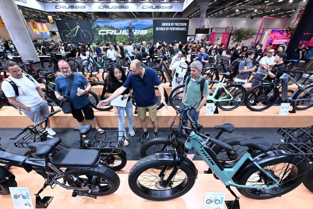 Electric bikes are on display at the booth of Totem Bikes at the EUROBIKE 2026 fair of the international bicycle industry in Frankfurt am Main, western Germany on June 24, 2026. According to the organisers, more than 1,500 exhibitors of the bicycle and ecomobility industry from 60 countries will present their products and services during the fair running from June 24 to June 27, 2026. (Photo by Kirill KUDRYAVTSEV / AFP)