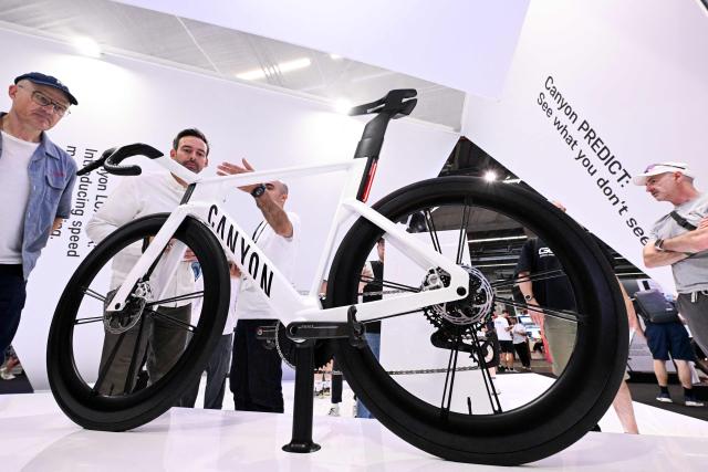 People visit the booth of Canyon at the EUROBIKE 2026 fair of the international bicycle industry in Frankfurt am Main, western Germany on June 24, 2026. According to the organisers, more than 1,500 exhibitors of the bicycle and ecomobility industry from 60 countries will present their products and services during the fair running from June 24 to June 27, 2026. (Photo by Kirill KUDRYAVTSEV / AFP)