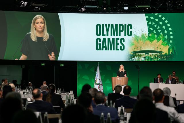 International Olympic Committee President (IOC) Kirsty Coventry delivers her speech at the opening of an IOC session, in Lausanne, on June 24, 2026. (Photo by Fabrice COFFRINI / AFP)