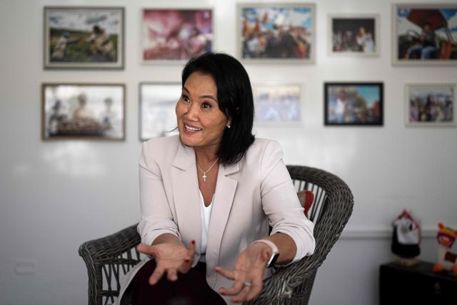 (FILES) Peru's presidential candidate Keiko Fujimori, for the Fuerza Popular party, speaks during an interview with AFP at the party headquarters in Lima on April 10, 2026. Right-wing presidential candidate Keiko Fujimori appeared to get an unassailable lead as the victor on late June 23, 2026, in Peru's presidential runoff election vote count. With 99.86 percent of ballots tallied, Fujimori had 50.12 percent of the June 7 vote, a margin of just over 43,000 over her leftist opponent Roberto Sanchez, with an estimated 39,300 votes remaining, according to the National Office of Electoral Processes (ONPE). Keiko Fujimori has run for the nation's presidency three elections in a row -- and three times, she has lost. But on this, her fourth attempt, she is on the verge of winning. (Photo by Ernesto BENAVIDES / AFP)