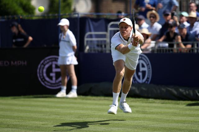 Italy's Jannik Sinner returns to Britain's Cameron Norrie during their men's singles exhibition match during the Giorgio Armani Tennis Classic tournament at the Hurlingham Club in London on June 24, 2026. (Photo by Henry NICHOLLS / AFP)