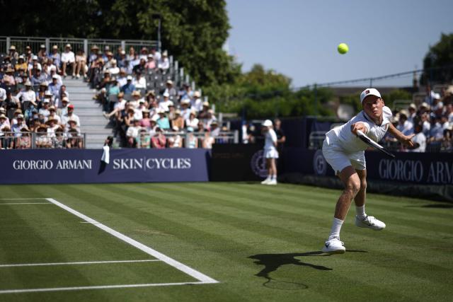 Italy's Jannik Sinner returns to Britain's Cameron Norrie during their men's singles exhibition match during the Giorgio Armani Tennis Classic tournament at the Hurlingham Club in London on June 24, 2026. (Photo by Henry NICHOLLS / AFP)