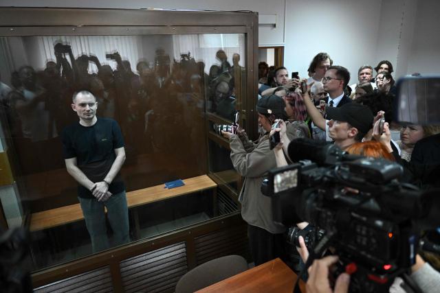 Maxim Kruglov, Russian opposition politician and deputy chair of the liberal Yabloko political party, charged with spreading "fake information" on the Russian army, listens to his verdict at a court in Moscow on June 24, 2026. (Photo by Igor IVANKO / AFP)