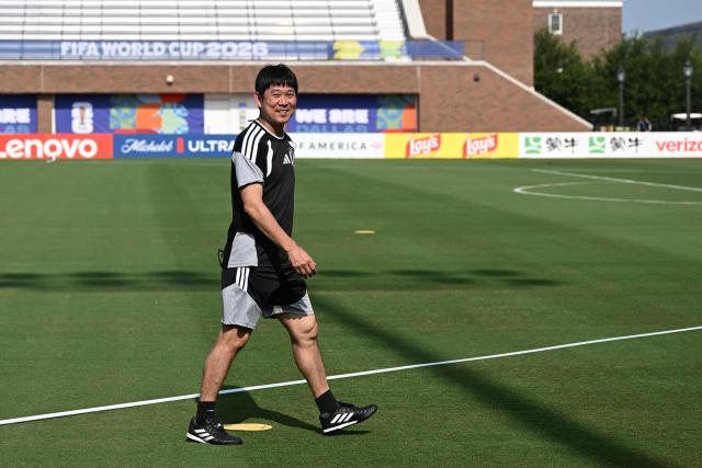 Japan's head coach Hajime Moriyasu takes part in a training session on the eve of the 2026 World Cup football tournament Group F football match between Japan and Sweden at Dallas Stadium training facility in Dallas on June 24, 2026. (Photo by Paul ELLIS / AFP)