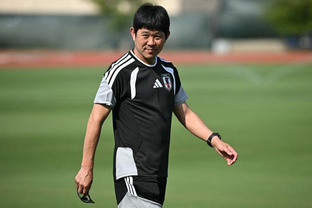 Japan's head coach Hajime Moriyasu takes part in a training session on the eve of the 2026 World Cup football tournament Group F football match between Japan and Sweden at Dallas Stadium training facility in Dallas on June 24, 2026. (Photo by Paul ELLIS / AFP)