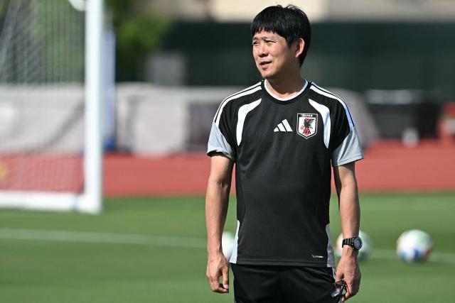 Japan's head coach Hajime Moriyasu takes part in a training session on the eve of the 2026 World Cup football tournament Group F football match between Japan and Sweden at Dallas Stadium training facility in Dallas on June 24, 2026. (Photo by Paul ELLIS / AFP)