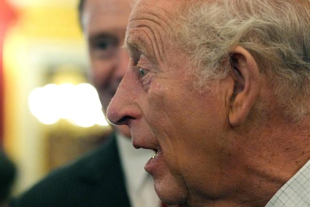 Beads of sweat runs down the cheek Britain's King Charles III as he attends a London Climate Week reception, hosted by the Department for Energy Security and Net Zero (DESNZ), at St James's Palace, London on June 24, 2026. (Photo by Yui Mok / POOL / AFP)