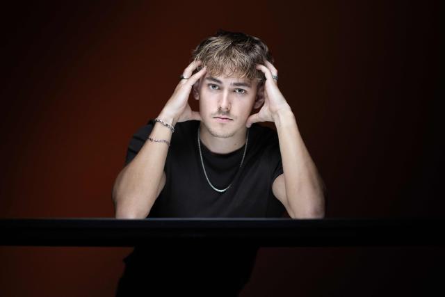 Swiss writer Nelio Biedermann poses during a photo session in Paris on June 24, 2026. (Photo by Joel Saget / AFP)