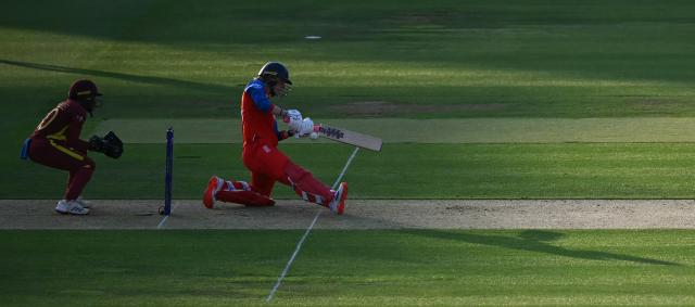 England's Freya Kemp misses a ball from West Indies' captain Hayley Matthews and is bowled during the ICC Women's T20 cricket world cup 2026 match between England and West Indies, at Lord's in London on June 24, 2026. (Photo by JUSTIN TALLIS / AFP)
