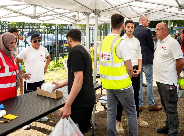 Netherlands' Prime Minister Rob Jetten listens during a visit to the IND registration centre in Ter Apel on June 24, 2026. (Photo by Remko de Waal / ANP / AFP) / Netherlands OUT