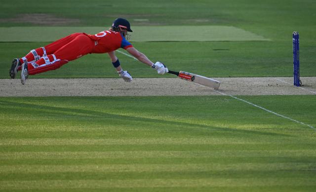 England's Heather Knight dives to make her ground during the ICC Women's T20 cricket world cup 2026 match between England and West Indies, at Lord's in London on June 24, 2026. (Photo by JUSTIN TALLIS / AFP)