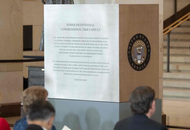 The Semiquincentennial Congressional Time Capsule in honor of the 250th birthday of the United States to be opened on the 500th anniversary of the founding of the United States, is seen after its unveiling during a ceremony in Emancipation Hall at the US Capitol in Washington, DC, on June 24, 2026. The capsule, that will be buried at the Independence National Historical Park in Philadelphia on July 4, features contributions from all 50 states, US territories and federal partners. Artifacts include state-specific mementos, student artwork, an Olympic gold medal, and a letter from living presidents. (Photo by SAUL LOEB / AFP)