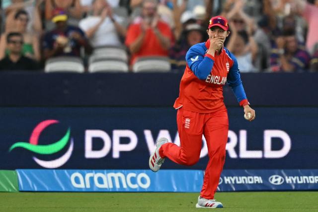 England's Alice Capsey reacts after taking a catch on the boundary to dismiss West Indies' Deandra Dottin during the ICC Women's T20 cricket world cup 2026 match between England and West Indies, at Lord's in London on June 24, 2026. (Photo by JUSTIN TALLIS / AFP)