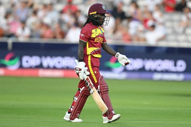 West Indies' Deandra Dottin walks back to the pavilion having lost her wicket for 19 runs during the ICC Women's T20 cricket world cup 2026 match between England and West Indies, at Lord's in London on June 24, 2026. (Photo by JUSTIN TALLIS / AFP)