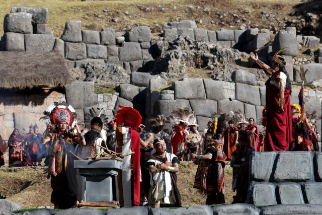 Actors perform in a reenactment at the Sacsayhuaman fortress during the Inti Raymi, a traditional Inca New Year and winter solstice celebration, in Cusco, Peru, on June 24, 2026. The Inti Raymi is the most important indigenous ceremony of the Peruvian Andes, held in honor of the god Inti (Quechua for "sun") at the beginning of the winter solstice. (Photo by Jose Angulo / AFP)