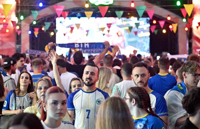 Bosnia and Herzegovina's supporters cheer during a public viewing of the Bosnia and Herzegovina World Cup 2026 football match against Qatar in Sarajevo on June 24, 2026. (Photo by ELVIS BARUKCIC / AFP)
