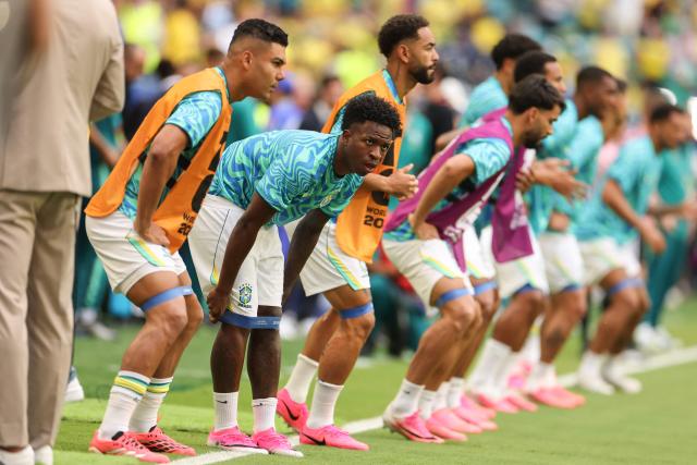 Brazil's forward #07 Vinicius Junior warms up ahead of the 2026 World Cup Group C football match between Scotland and Brazil at the Miami Stadium in Miami Gardens on June 24, 2026.  (Photo by PATRICIA DE MELO MOREIRA / AFP)