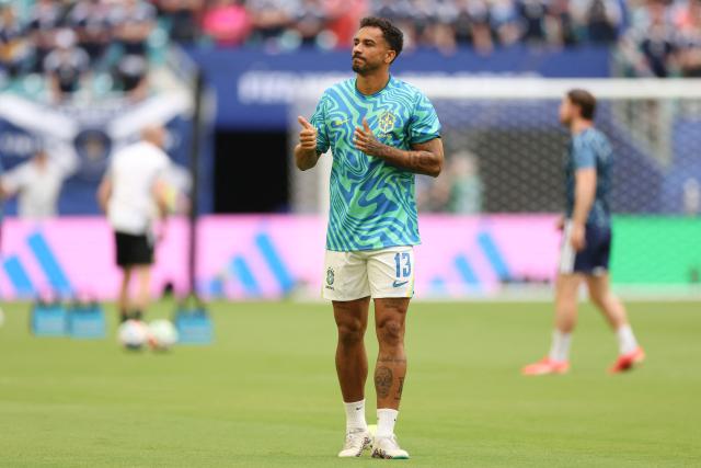 Brazil's defender #13 Danilo warms up ahead of the 2026 World Cup Group C football match between Scotland and Brazil at the Miami Stadium in Miami Gardens on June 24, 2026.  (Photo by PATRICIA DE MELO MOREIRA / AFP)