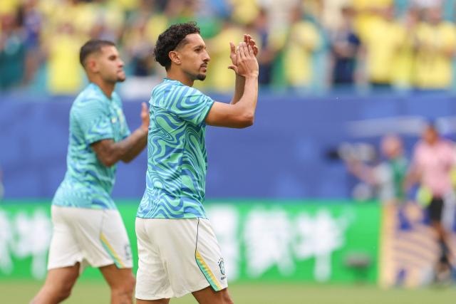 Brazil's defender #04 Marquinhos warms up ahead of the 2026 World Cup Group C football match between Scotland and Brazil at the Miami Stadium in Miami Gardens on June 24, 2026.  (Photo by PATRICIA DE MELO MOREIRA / AFP)