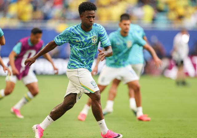 Brazil's forward #07 Vinicius Junior warms up ahead of the 2026 World Cup Group C football match between Scotland and Brazil at the Miami Stadium in Miami Gardens on June 24, 2026.  (Photo by PATRICIA DE MELO MOREIRA / AFP)