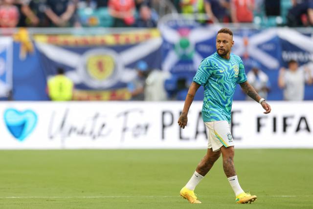 Brazil's forward #10 Neymar warms up ahead of the 2026 World Cup Group C football match between Scotland and Brazil at the Miami Stadium in Miami Gardens on June 24, 2026.  (Photo by PATRICIA DE MELO MOREIRA / AFP)