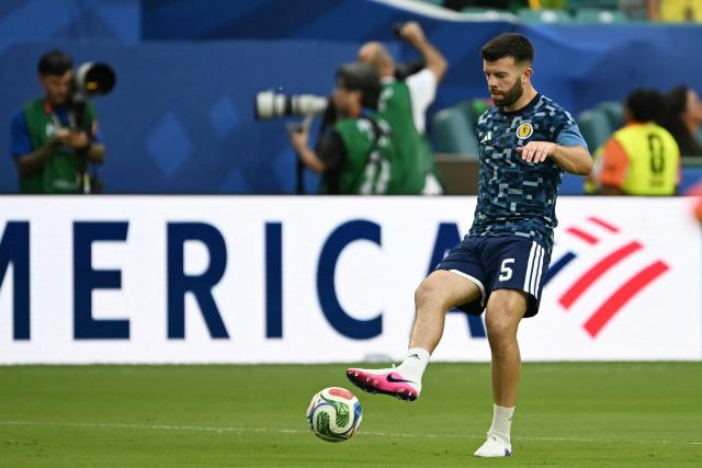 Scotland's defender #05 Grant Hanley warms up ahead of the 2026 World Cup Group C football match between Scotland and Brazil at the Miami Stadium in Miami Gardens on June 24, 2026.  (Photo by CHANDAN KHANNA / AFP)