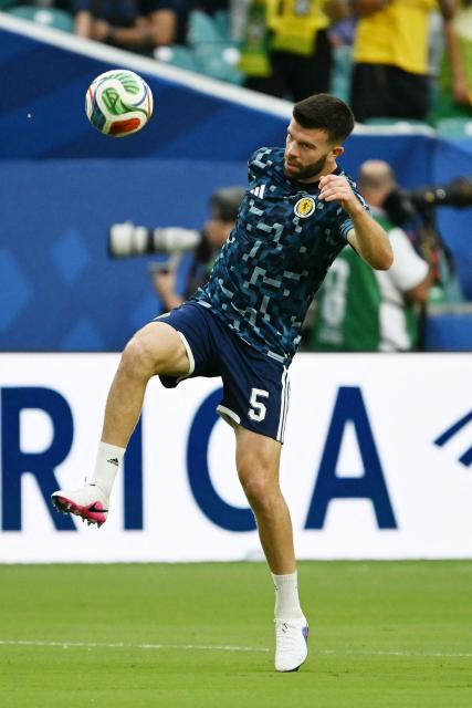 Scotland's defender #05 Grant Hanley warms up ahead of the 2026 World Cup Group C football match between Scotland and Brazil at the Miami Stadium in Miami Gardens on June 24, 2026.  (Photo by CHANDAN KHANNA / AFP)