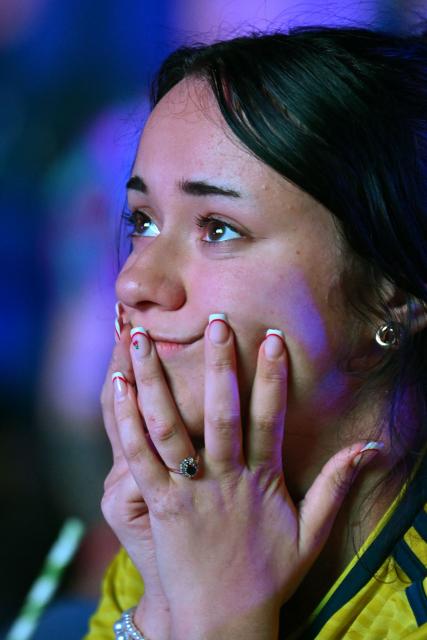 A Scotland supporter watches the 2026 World Cup Group C football match between Scoland and Brazil, at the 4TheFans Fan Park at The Pitt in Edinburgh, Scotland on June 24, 2026. (Photo by ANDY BUCHANAN / AFP)