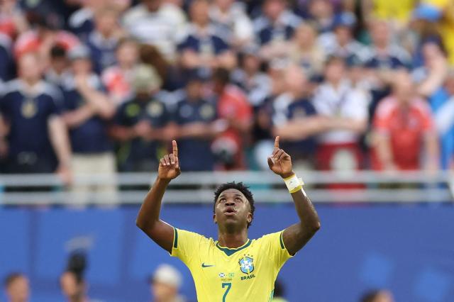 Brazil's forward #07 Vinicius Junior reacts after scoring a goal later dissalowed by a VAR desicion during the 2026 World Cup Group C football match between Scotland and Brazil at the Miami Stadium in Miami Gardens on June 24, 2026.  (Photo by PATRICIA DE MELO MOREIRA / AFP)
