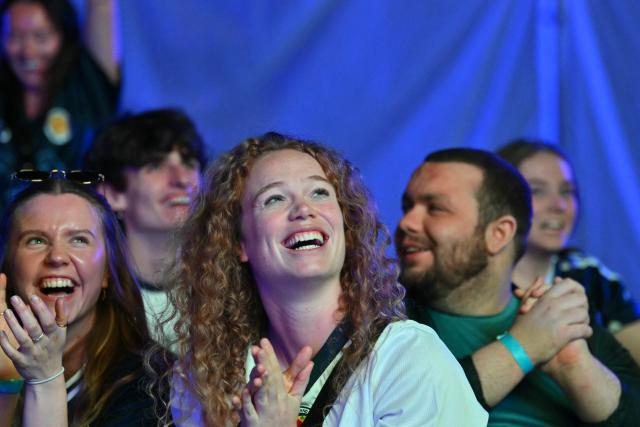 Scotland supporters react to the referee overturning a possible second goal for Brazil while watching the 2026 World Cup Group C football match between Scoland and Brazil, at the 4TheFans Fan Park at The Pitt in Edinburgh, Scotland on June 24, 2026. (Photo by ANDY BUCHANAN / AFP)