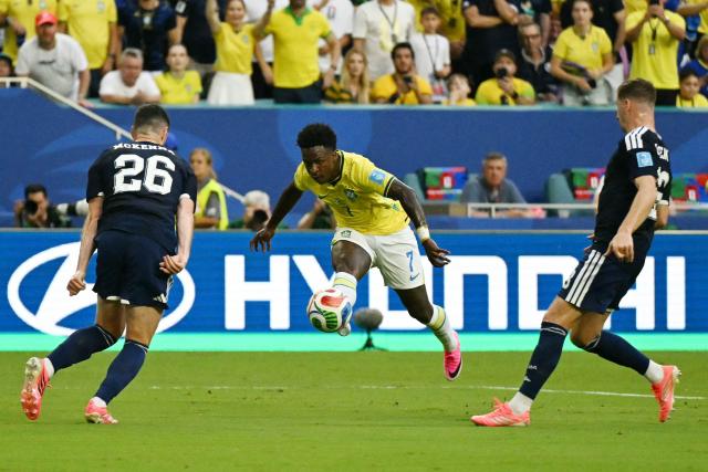 Brazil's forward #07 Vinicius Junior kicks the ball during the 2026 World Cup Group C football match between Scotland and Brazil at the Miami Stadium in Miami Gardens on June 24, 2026.  (Photo by CHANDAN KHANNA / AFP)