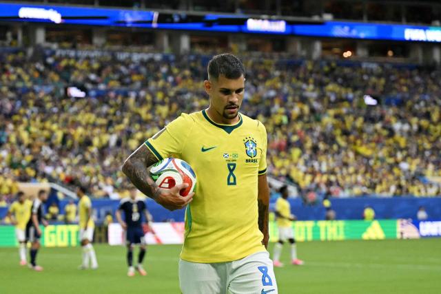 Brazil's midfielder #08 Bruno Guimaraes gestures during the 2026 World Cup Group C football match between Scotland and Brazil at the Miami Stadium in Miami Gardens on June 24, 2026.  (Photo by CHANDAN KHANNA / AFP)