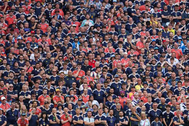 Scotland fans cheer during the 2026 World Cup Group C football match between Scotland and Brazil at the Miami Stadium in Miami Gardens on June 24, 2026.  (Photo by PATRICIA DE MELO MOREIRA / AFP)