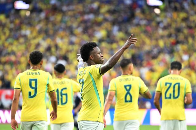 Brazil's forward #07 Vinicius Junior celebrates after scoring his team's second goal during the 2026 World Cup Group C football match between Scotland and Brazil at the Miami Stadium in Miami Gardens on June 24, 2026.  (Photo by CHANDAN KHANNA / AFP)