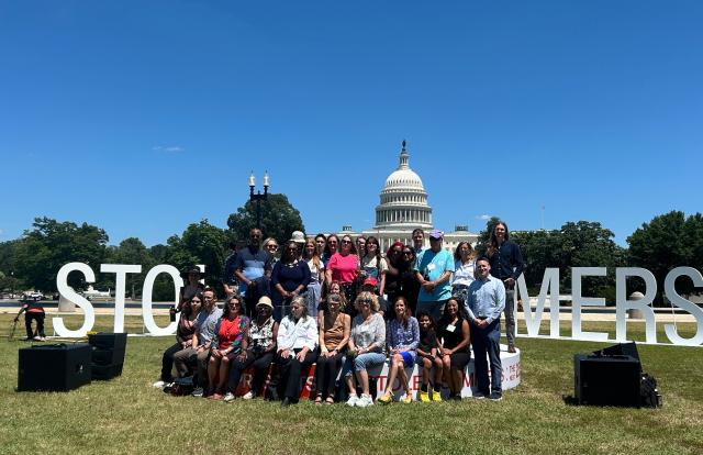 Climate survivors pose in front of the “Summers Stolen” exhibit, organized by the Extreme Weather Survivors organization in Washington, DC, on June 24, 2026. “But what is our government doing?” In Washington, dozens of survivors of floods, heatwaves, wildfires and extreme hurricanes from all over the country are, as the 250th anniversary of the United States approaches, denouncing the lack of preparedness of the world’s leading power for an increasingly present climate threat. Coming from about twenty states, including Hawaii, Louisiana and Vermont, these some 70 Americans brought together by the association “Extreme Weather Survivors” stand out for their heterogeneity. (Photo by Charlotte CAUSIT / AFP)