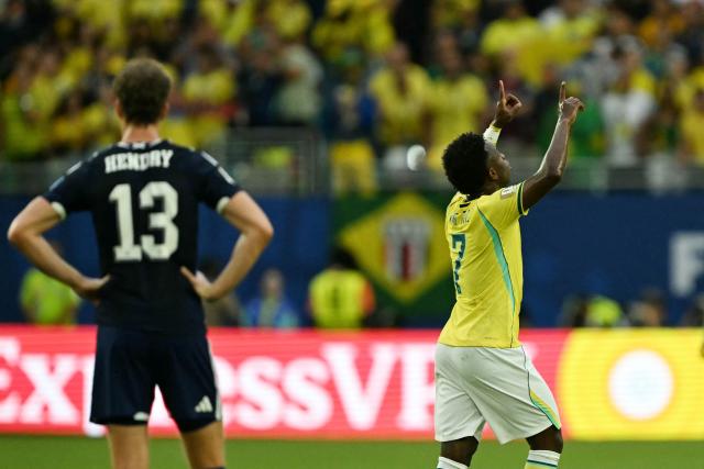 Brazil's forward #07 Vinicius Junior reacts after scoring a goal later dissalowed by a VAR desicion during the 2026 World Cup Group C football match between Scotland and Brazil at the Miami Stadium in Miami Gardens on June 24, 2026.  (Photo by CHANDAN KHANNA / AFP)