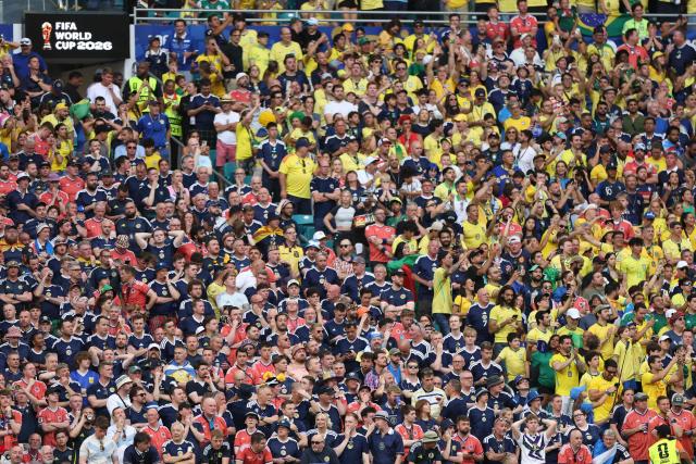 Scotland and Brazil fans cheer during the 2026 World Cup Group C football match between Scotland and Brazil at the Miami Stadium in Miami Gardens on June 24, 2026.  (Photo by PATRICIA DE MELO MOREIRA / AFP)