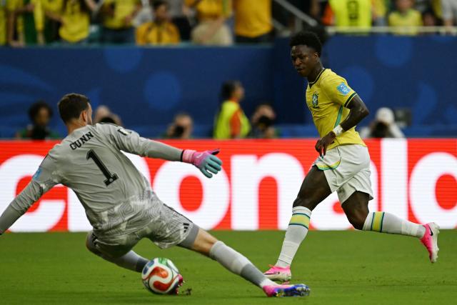 Brazil's forward #07 Vinicius Junior scores a goal later dissalowed by a VAR desicion during the 2026 World Cup Group C football match between Scotland and Brazil at the Miami Stadium in Miami Gardens on June 24, 2026.  (Photo by CHANDAN KHANNA / AFP)