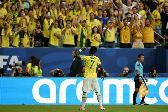 Brazil's forward #07 Vinicius Junior reacts after scoring a goal later dissalowed by a VAR desicion during the 2026 World Cup Group C football match between Scotland and Brazil at the Miami Stadium in Miami Gardens on June 24, 2026.  (Photo by CHANDAN KHANNA / AFP)