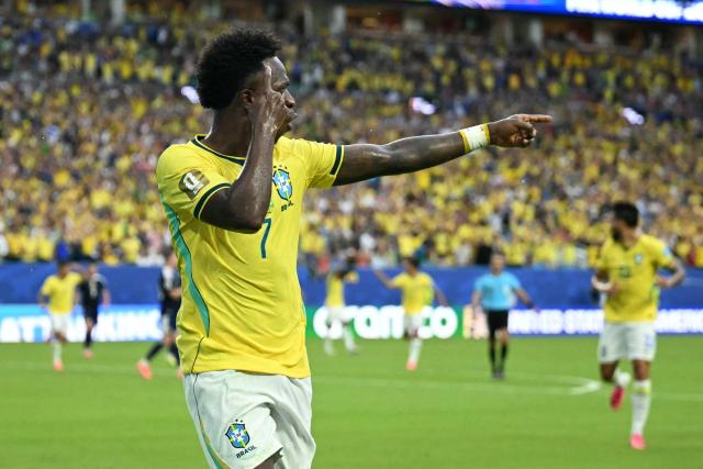 Brazil's forward #07 Vinicius Junior celebrates after scoring his team's second goal during the 2026 World Cup Group C football match between Scotland and Brazil at the Miami Stadium in Miami Gardens on June 24, 2026.  (Photo by CHANDAN KHANNA / AFP)