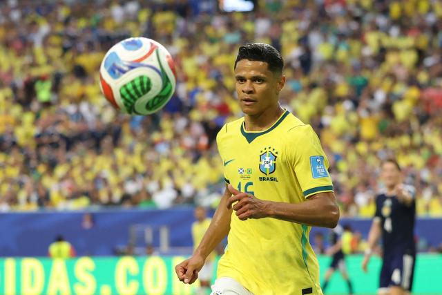 Brazil's defender #16 Douglas Santos eyes the ball during the 2026 World Cup Group C football match between Scotland and Brazil at the Miami Stadium in Miami Gardens on June 24, 2026.  (Photo by PATRICIA DE MELO MOREIRA / AFP)