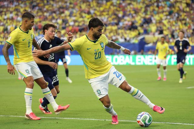 Brazil's midfielder #20 Lucas Paqueta kicks the ball during the 2026 World Cup Group C football match between Scotland and Brazil at the Miami Stadium in Miami Gardens on June 24, 2026.  (Photo by PATRICIA DE MELO MOREIRA / AFP)