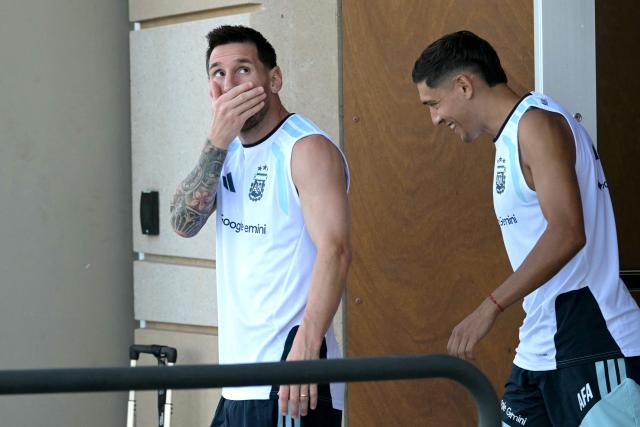 Argentina's forward #10 Lionel Messi (L) gestures as he arrives at a training session as part of the 2026 World Cup football tournament at Sporting KC Training Centre in Kansas City on June 24, 2026. (Photo by JUAN MABROMATA / AFP)