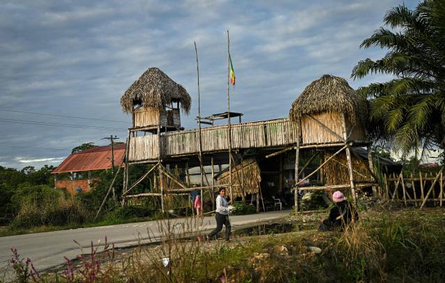 A view shows a barricade blocking the entrance to Lauca Ene, where Indigenous people and local residents spend the night while awaiting their leaders’ decision on whether to continue road blockades, in Cochabamba Department, Bolivia, on June 24, 2026. (Photo by MARTIN BERNETTI / AFP)