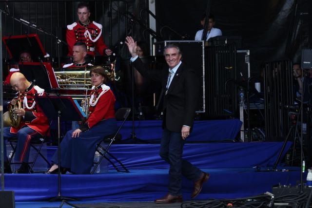 US Secretary of the Interior Doug Burgum waves to the crowd during a kick-off celebration for the "Great American State Fair" on the National Mall in Washington, DC, June 24, 2026. The "Great American State Fair" will be held from June 25 to July 10, 2026, to celebrate the 250th anniversary of US independence. (Photo by Jemal COUNTESS / AFP)