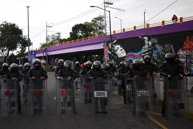 Policemen stand guard outside  the Mexico City Stadium in Mexico City on June 24, 2026 before the 2026 World Cup Group A football match between the Czech Republic and Mexico.  (Photo by CARL DE SOUZA / AFP)