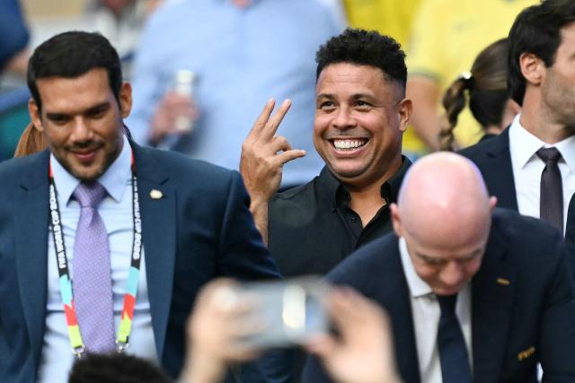 Brazil's football legend Ronaldo (C) attends the 2026 World Cup Group C football match between Scotland and Brazil at the Miami Stadium in Miami Gardens on June 24, 2026.  (Photo by CHANDAN KHANNA / AFP)